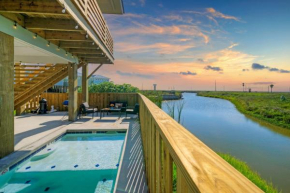 Boardwalk to the Beach Water Canal View Priv Pool Island Girl by AvantStay